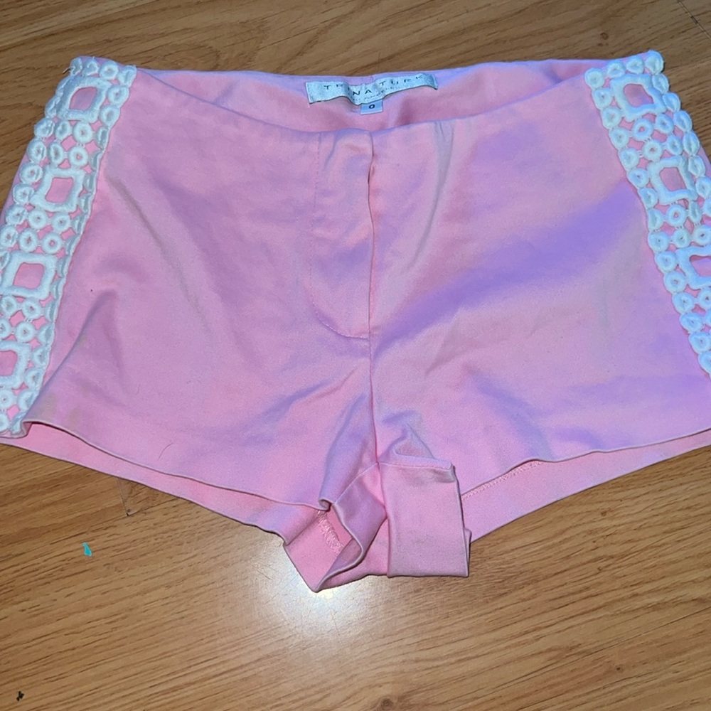 Trina Turk Pink Hot Shorts  with White embellishment on side . Size 0